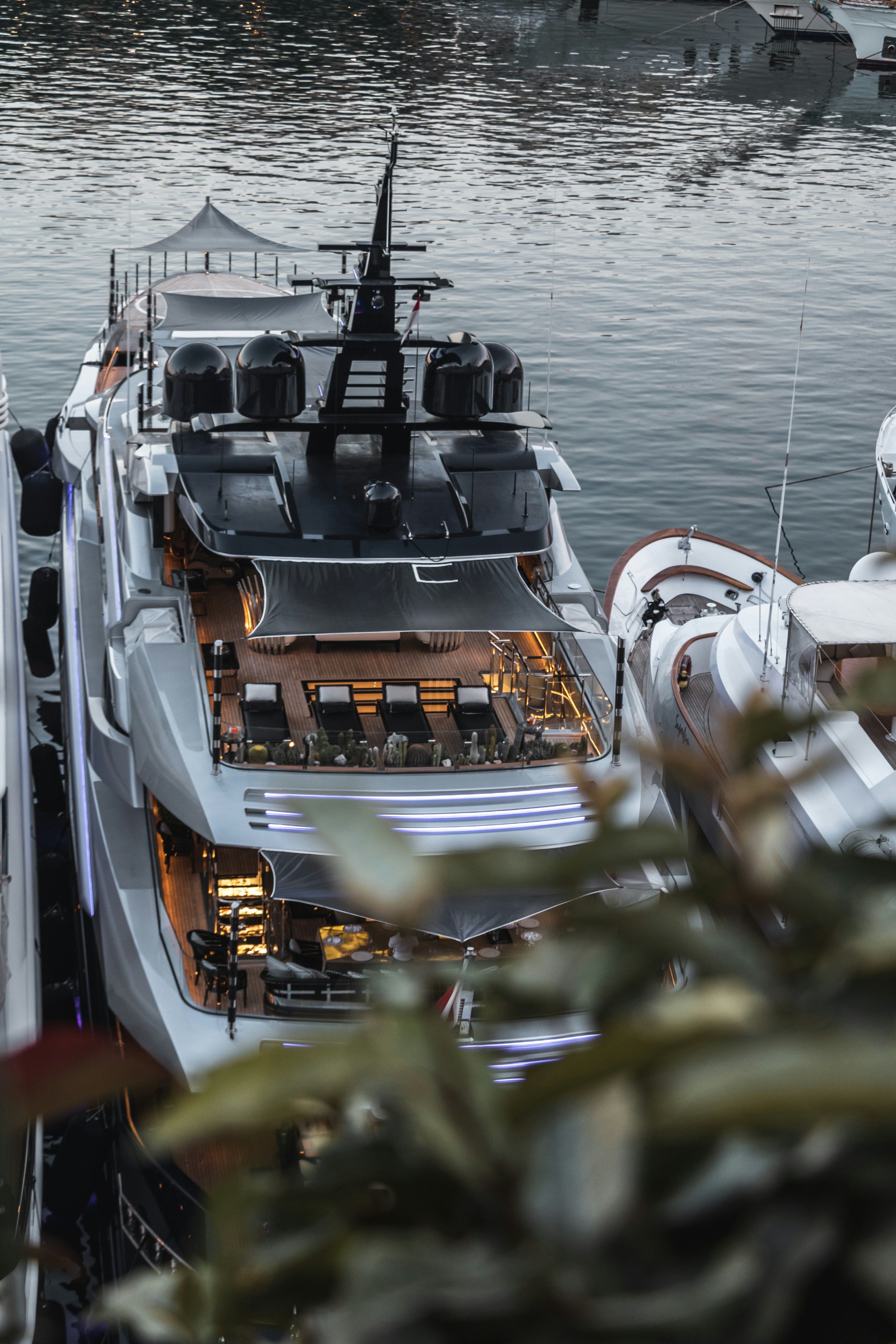 A motor yacht docked at a marina